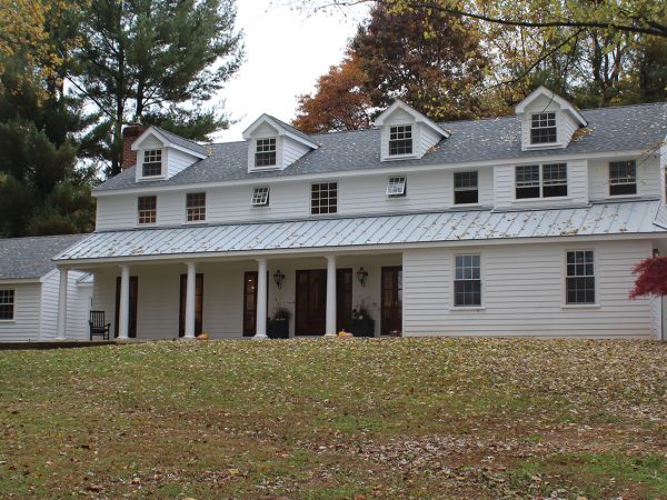 custom built asphalt roof on large home