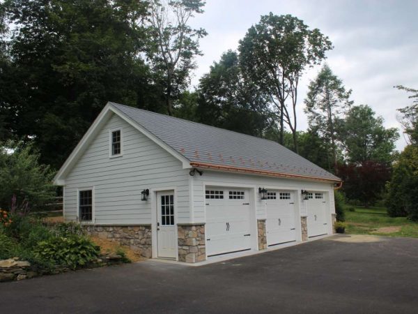 white custom three car garage