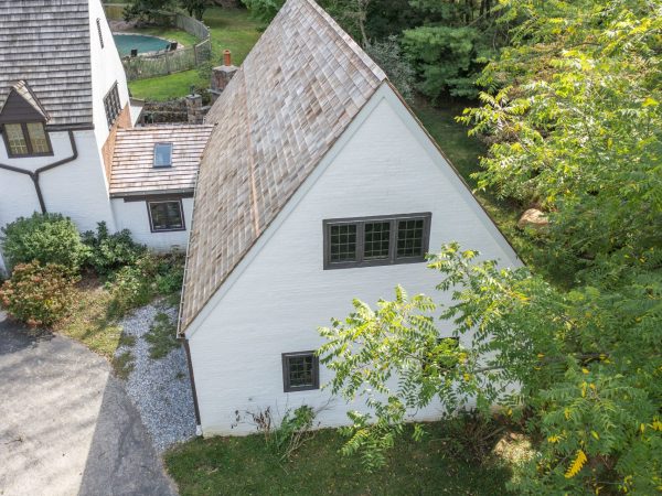 white stucco siding on two story garage