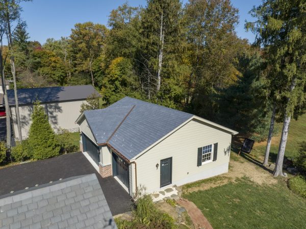 tan metal siding on workshop garage