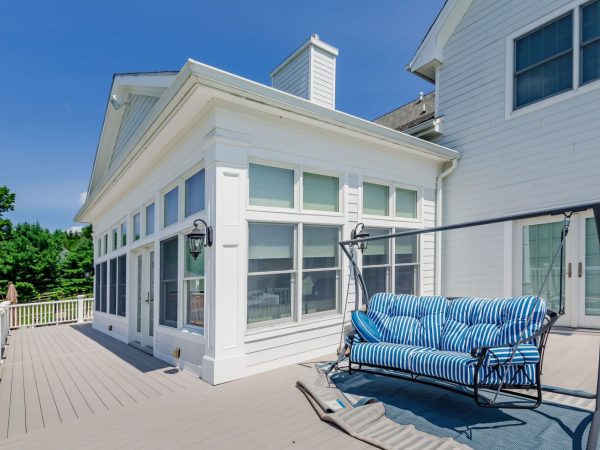 new deck construction with swinging seat