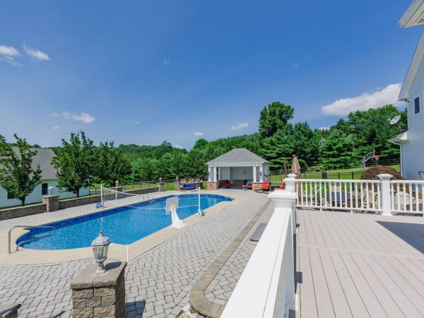 pool, pool house and deck view