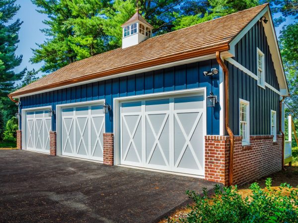 blue three car metal garage