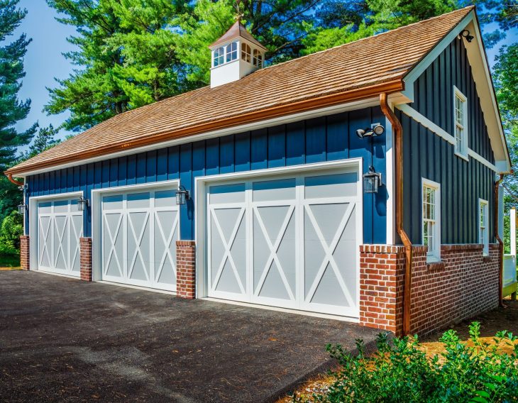 blue three car metal garage